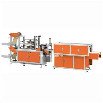 Wegwerp plastic handschoen die machine maakt